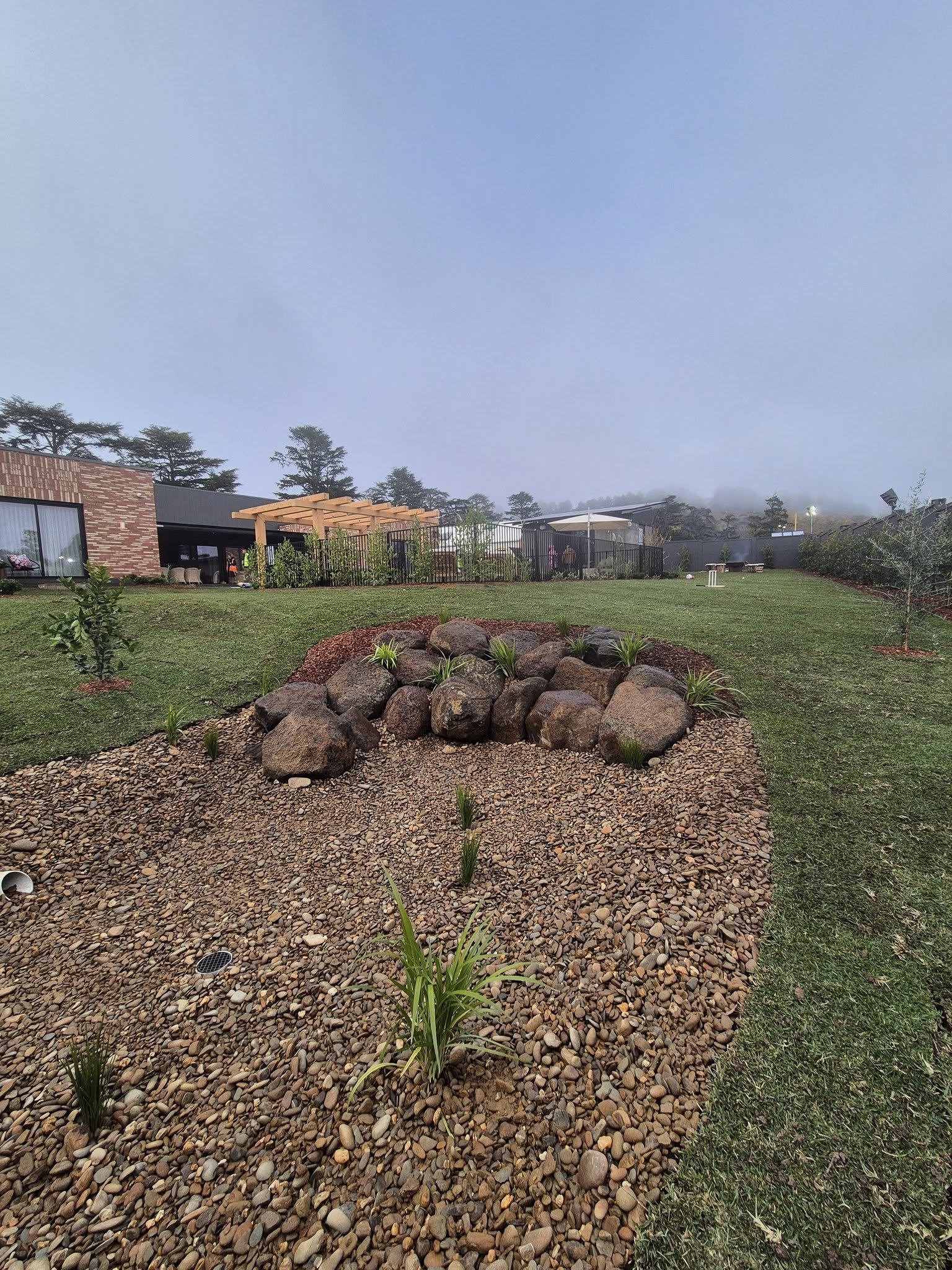Feature rockwork and planting to a new garden bed